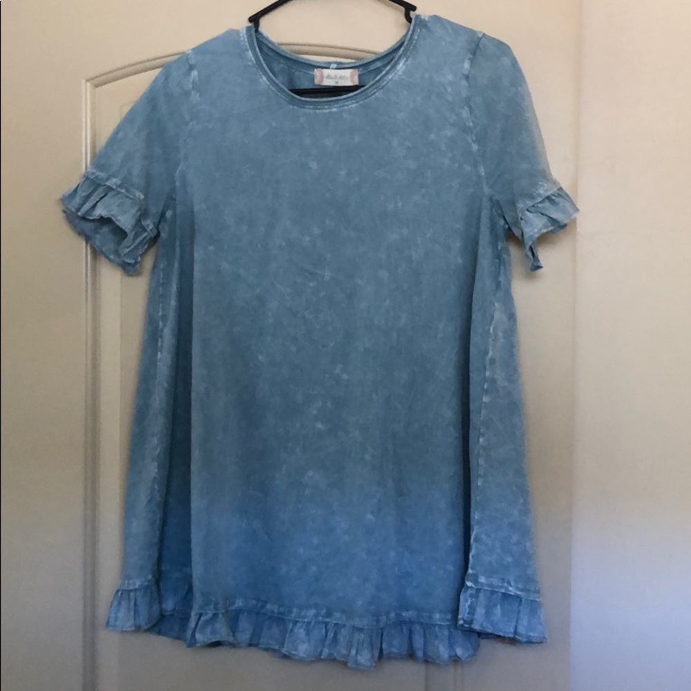 Blue ruffled blouse